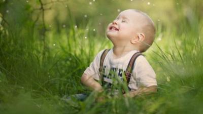Toddler boy in the sunshine