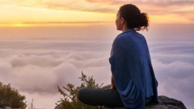 Woman rock clouds