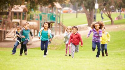 Children running on grass